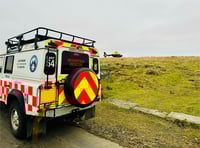 Volunteer rescuers search for lost walker in fog