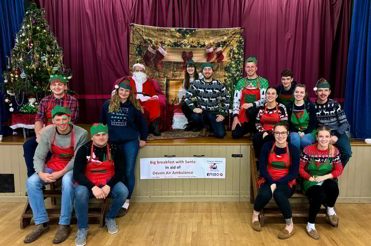 Pictured with Santa are young farmers' club members Luke Millman, Jordan Taylor, Harry Ball, Millie Logan, Lauren Abel, Tim Westcott, Rhys Hughes, Laura Westcott, Josh Sleep, Lily Kitson, Matt Tillier, Lauren Wonnacott and Stephanie Vellacott