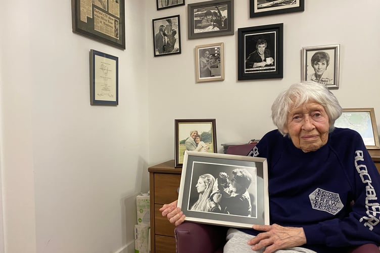 Former make-up artist to the stars - Shirley Bartlett (nee Muslin) with her 'wall of fame' of tributes from clients.