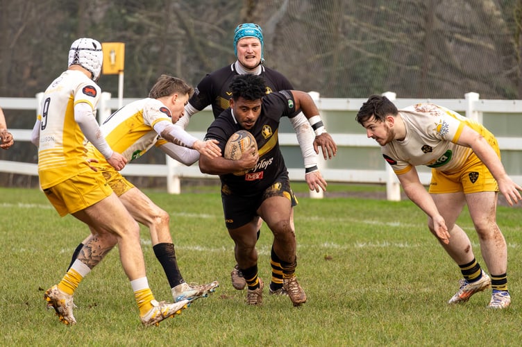 North Tawton defenders swarm against Crediton