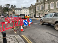 Broken manhole cover diverts drivers