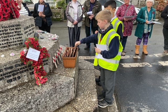 Walkhampton School taking part in the village Remembrance service.