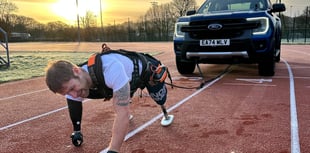 Royal Marine amputee's record vehicle pull on running track