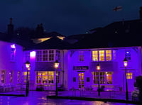 Yelverton Inn floodlit in purple commemorates Holocaust Memorial Day 