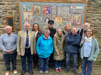 Community mosaic repaired