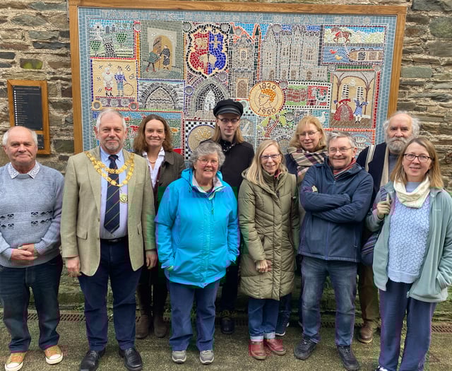 Community mosaic repaired