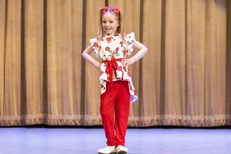 Pretty as a flower - Scarlett Hearn five, winning the UK finals of the Pure pageant.