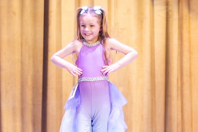 Scarlett Hearn, five, impressing the judges at the UK finals of he Pure US pageant