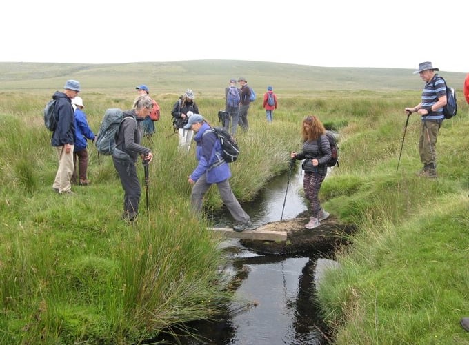 Charlotte Bil and other walkers exploring Dartmoor