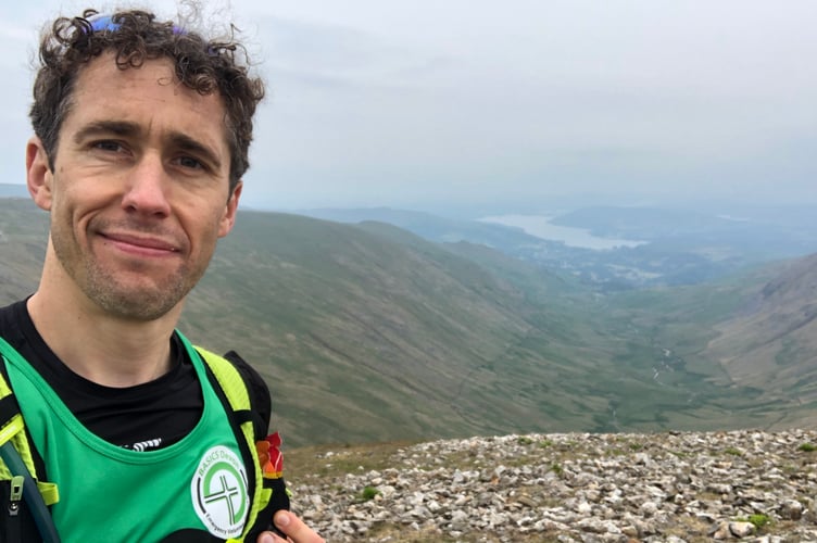 Volunteer emergency response BASICS Dr David Hutchins raising money for BASICS on his Lake District Ironman triathlon.