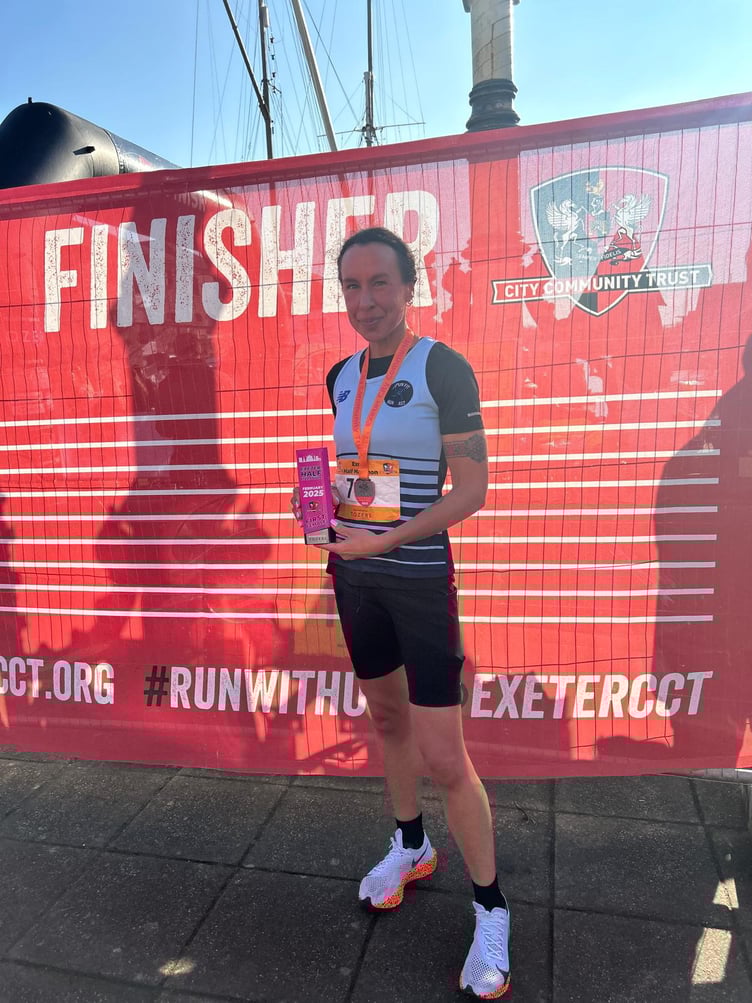 Holly Fitzgerald collects her trophy