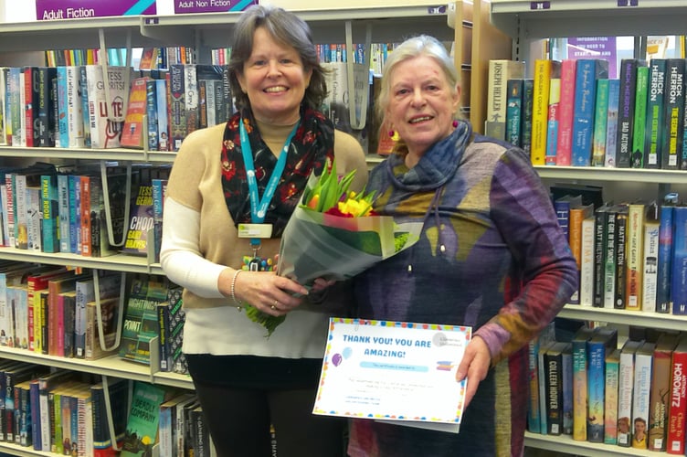 Carole Cornwall presented Jan Goffey with her certificate and flowers