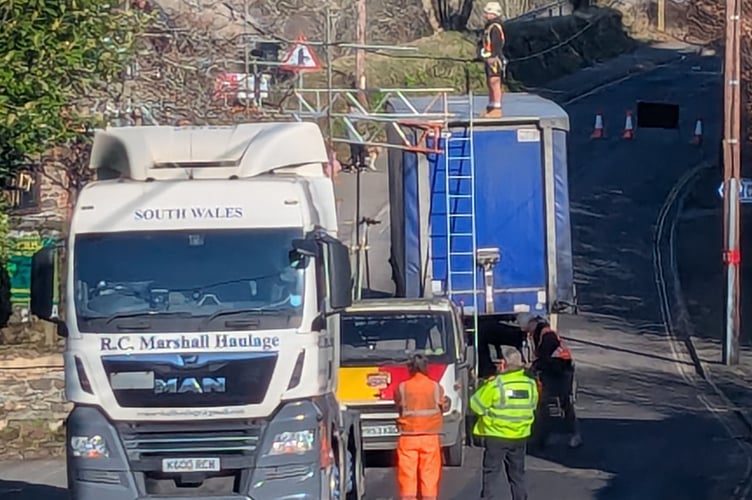 The scene outside the Market Inn in Tavistock after a lorry hit scaffolding