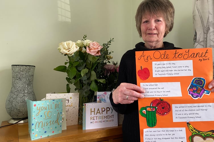 Janet Cope proudly holding her tributes from Tavistock Primary School on her retirement after 52 years.