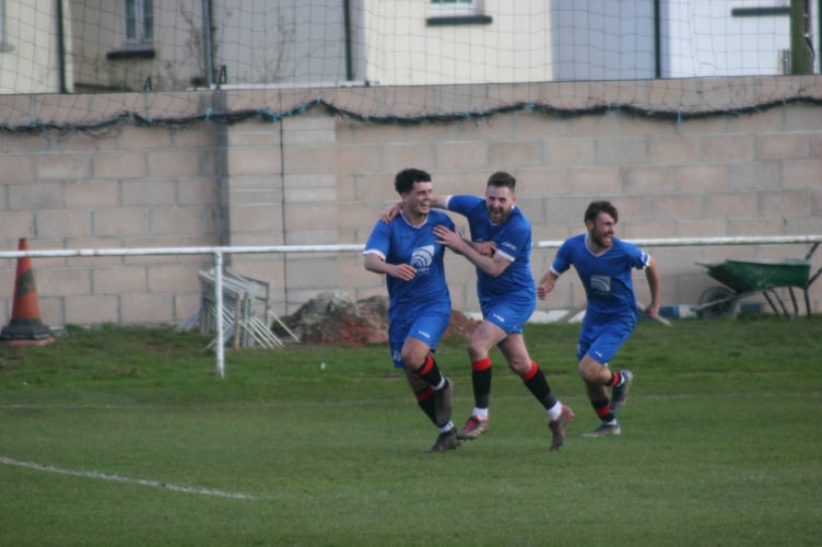 Mason Dolman-Zuccarro celebrates with his Newton Abbot Spurs teammates