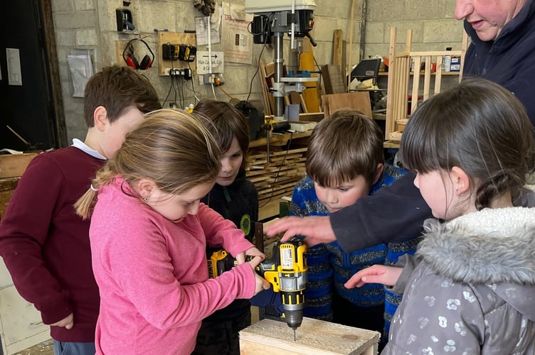 Horrabridge School learning how to make wildlife boxes at Burrator Reservoir.