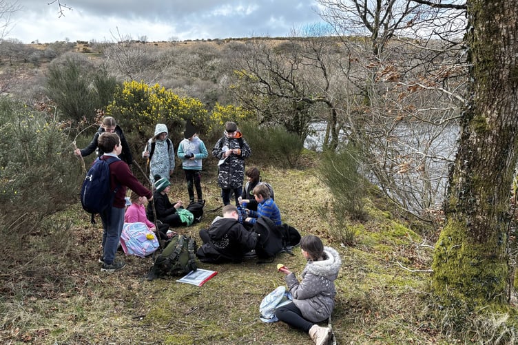 Horrabridge School pupils having an outdoor class at Burrator Reservoir.