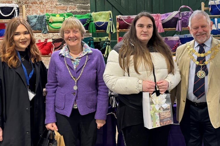 Tavistock's first youth market has been declared a success. Stall winner was the business Molly Makes. Pictured are Olivia Hughes (Tavistock Town Council) town Mayoress XXX Ward, Molly of Molly Makes, and Mayor Paul Ward. 