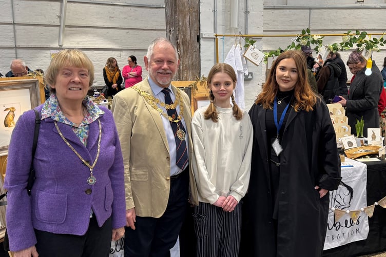 Tavistock's first youth market was popular with customers and young entrepreneurs. Youth Market stall holder winner Ella of Ellabees is pictured (third from left) with town Mayor Paul Ward and Mayoress XX Ward with Olivia Hughes, of the town council which supports the market.