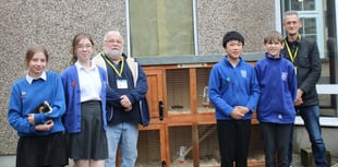 Men in Sheds build primary school children a hutch