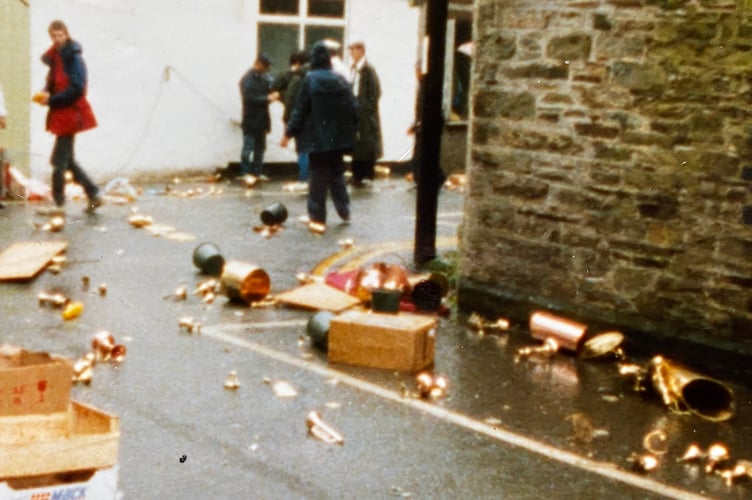 A still from the scene of filming for a TV series in which Charlie Snell's brassware is scattered by a car chase.