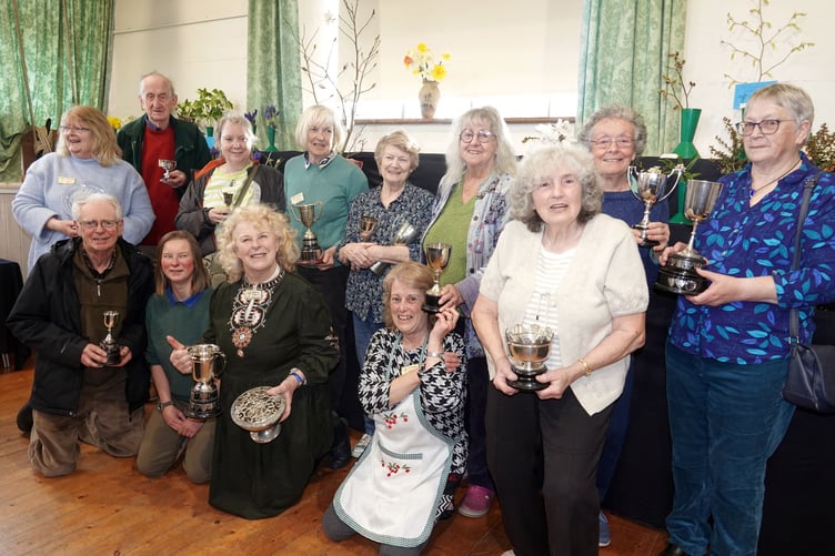 Prizewinners at the Bere Ferrers Spring Flower show with Jane  Morton, second from left front row, who presented the prizes. Picture: Ann Parsons.