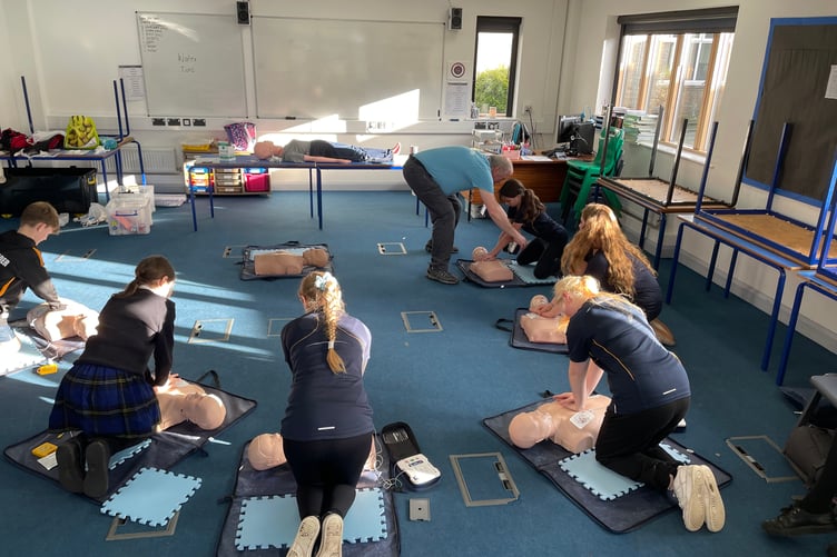 Giving them the tools they need to help in an emergency; training for older students includes CPR and how to use a defibrillator. (Picture: Callington Lions)