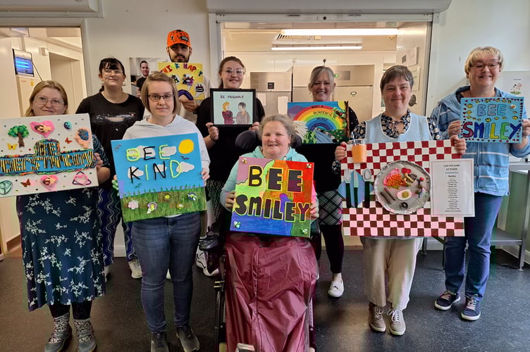  Oke Tree Network members with their 'Positive Vibes' artwork which went on display in the Made-Well Cafe at Castle Ham Lodge on a previous occasion