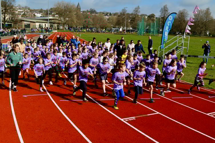 A purple celebration of Tavistock Athletic Club's Primary Schools Challenge - years 3-4 start.