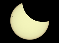 Partial eclipse captivates Devon