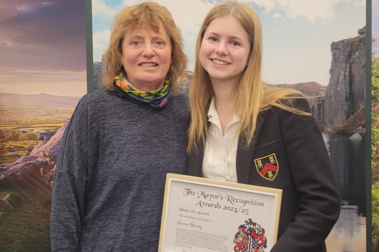 Dotty King (left) and Lauren Blamey with the mayoral award which Lauren received for organising a cancer charity fund-raising event after Dotty's cancer diagnosis.