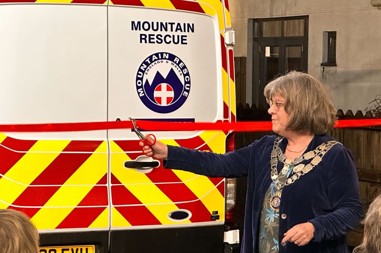 West Devon Mayor Debo Sellis ceremonially opens the new garage housing the vehicle fleet of Dartmoor Search & Rescue Team Tavistock.