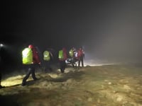 Rescue team aid hypothermic teenager