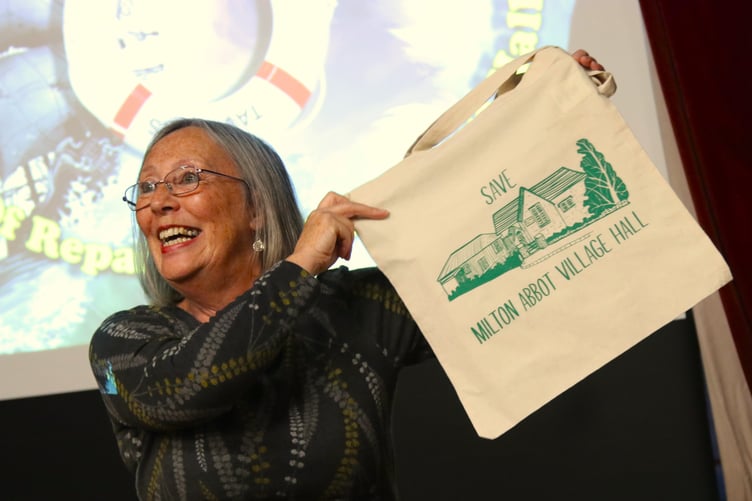 Milton Abbot village hall quiz and concert. XX holds up one of the fund raising bags. Picture by Chris Cottrell.
