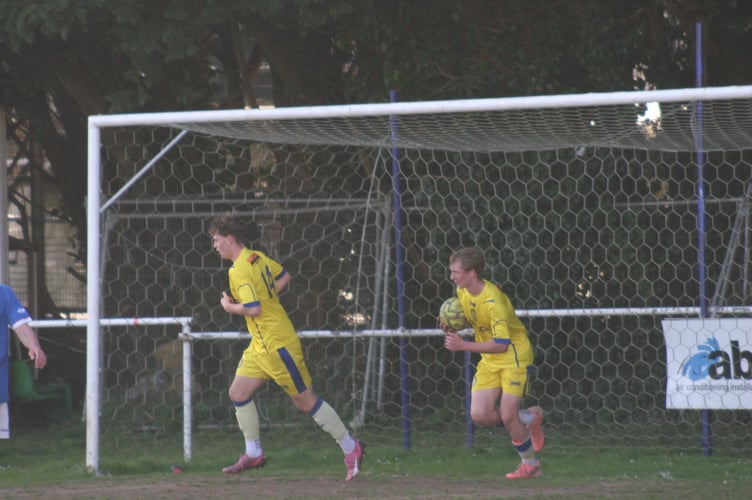 Okehampton Argyle players grab the ball after late strike at The Rec