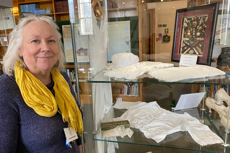 Tavistock Museum has reopened for the summer after a refresh. Museum manager Lesley Holliday shows off a new display of ladies' underclothes.
