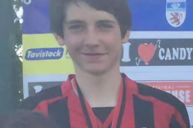 Daniel Willis pictured as an accomplished footballing youngster in football strip.