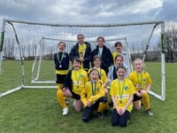 Local nursing home sponsors girls' football team