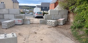 Concrete wall dividing Okehampton estate demolished following uproar