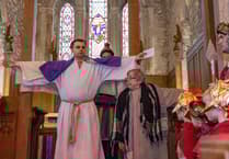 Good Friday story moves inside due to biblical deluge