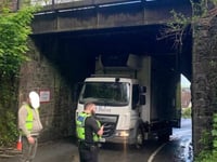 Lorry stuck under the railway bridge in Okehampton
