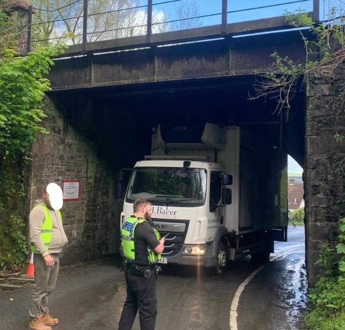 Lorry stuck under the railway bridge in Okehampton
