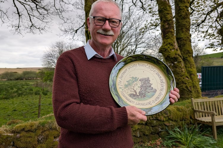 Simon Dell receives his award from the Dartmoor Society. Picture by  Max Piper.