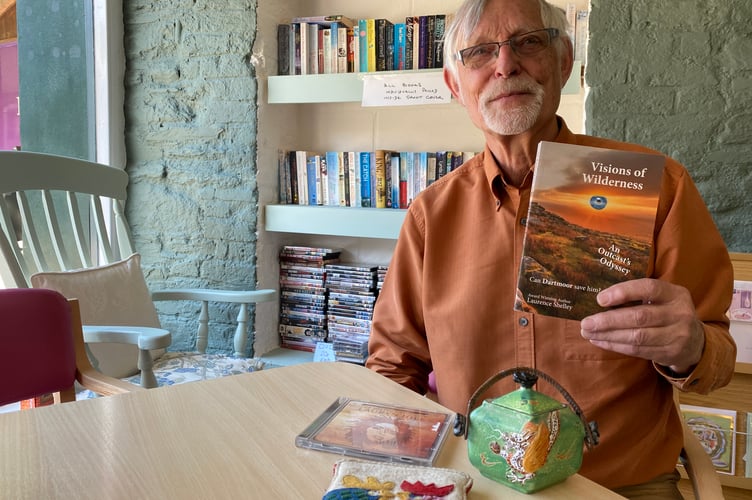 Author Laurence Shelley with his latest book and possessions he hopes to reunite with the real life person on whom he bases a character. 