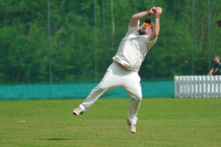 Devon Cricket League C Division West.Ipplepen 2nd XI versus Kingsbridge 1st XI. Pen's M Green succesfully catches out Kingsbridge batsman T Hirons 