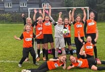 Horrabridge young footballers walk for new kit