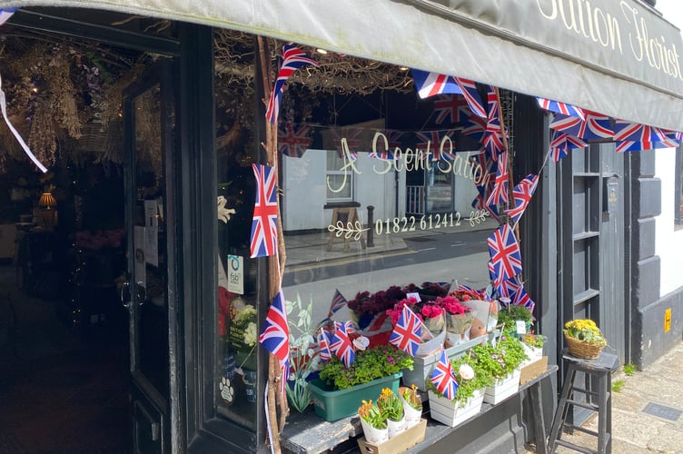 A Tavistock flower shop is waving the flag for the town's VE Day events today. 
