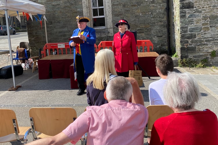 The town crier officially opening Tavistock's VE Day 80 events.