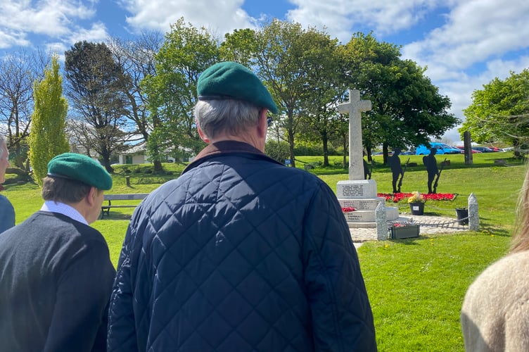 Veteran Royal Marines observing a two-minute silence at Princetown War Memorial on VE Day 80 in memory of all who gave their lives for their country.