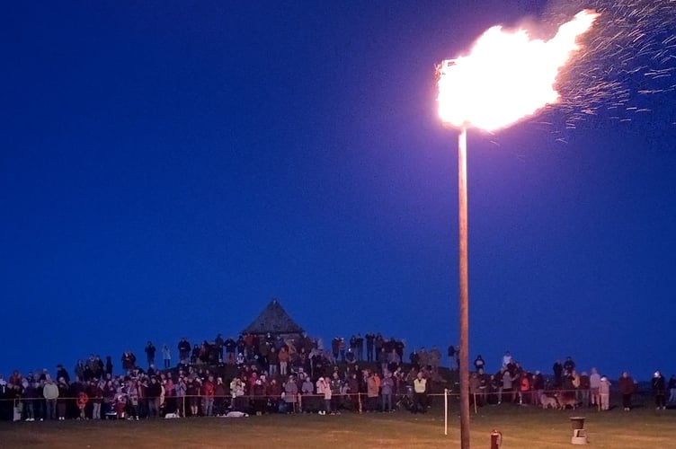 Tavistock Town Council's beacon of peace lit on Whitchurch Down - attending were WWII London evacuee Ken Bell and VE Day schools poster contest winner Toby Silvester, 8, of Whitchurch School.